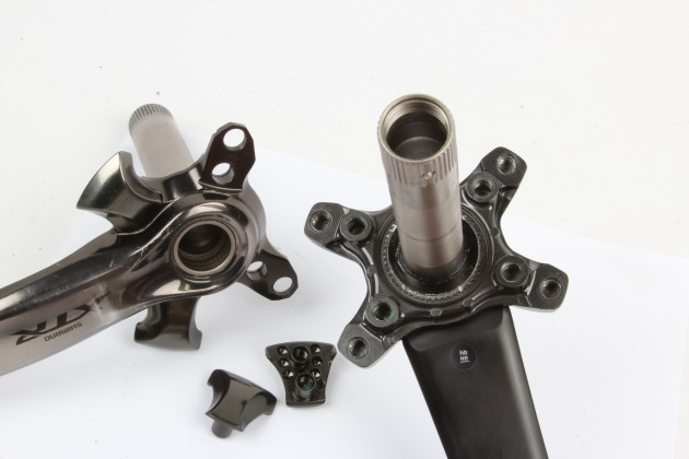 While XT and XTR cranks now share the same bolt pat tern, the 
different mounting systems stops Shimano users from mixing and matching chainring types.
